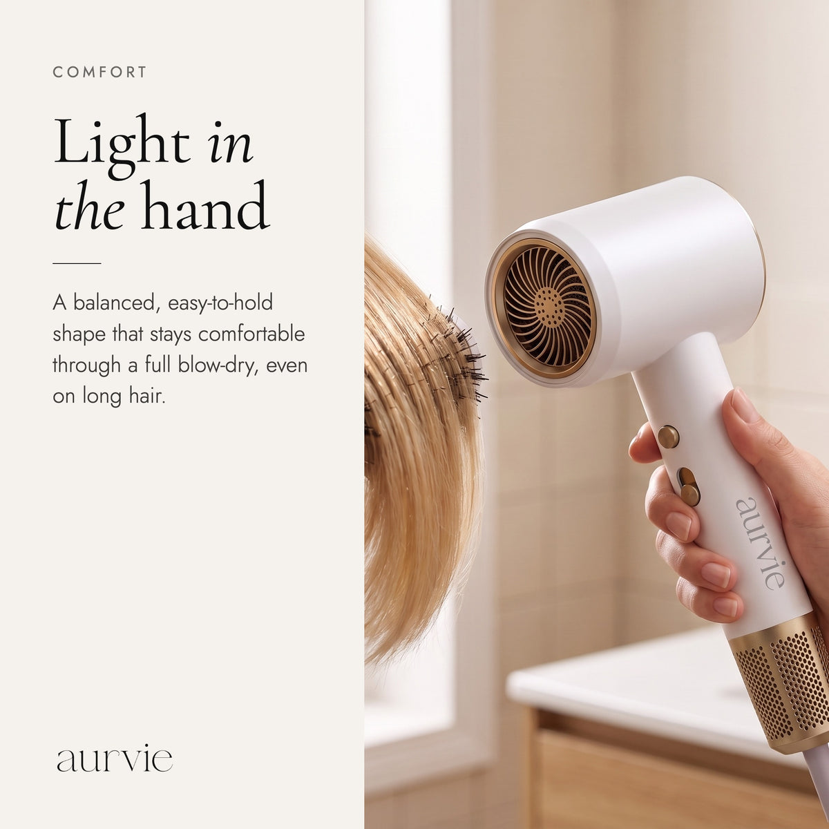 Light in the hand: white hair dryer held while styling (ALT)