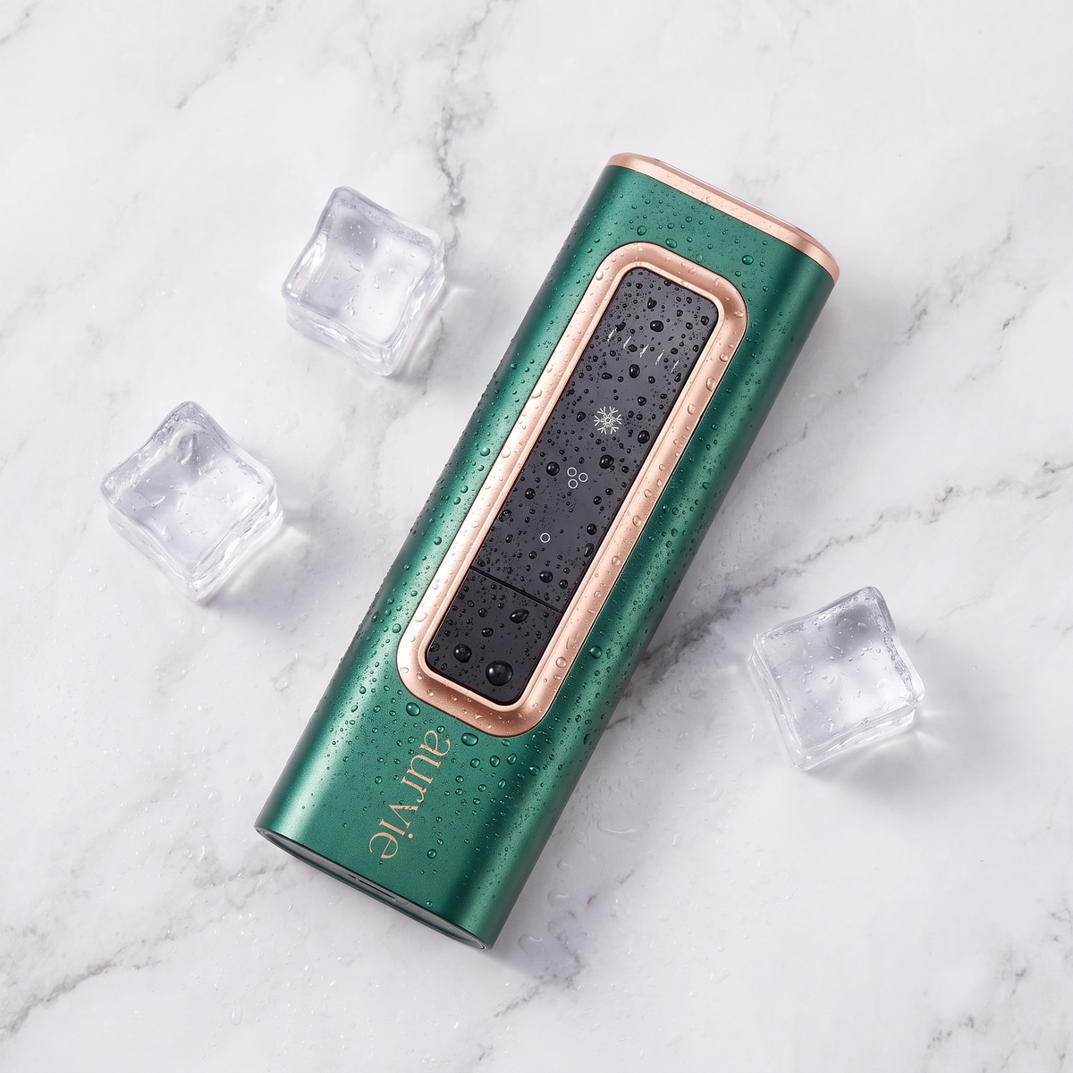 Aurvie IPL device on marble with ice cubes and water droplets (ALT)