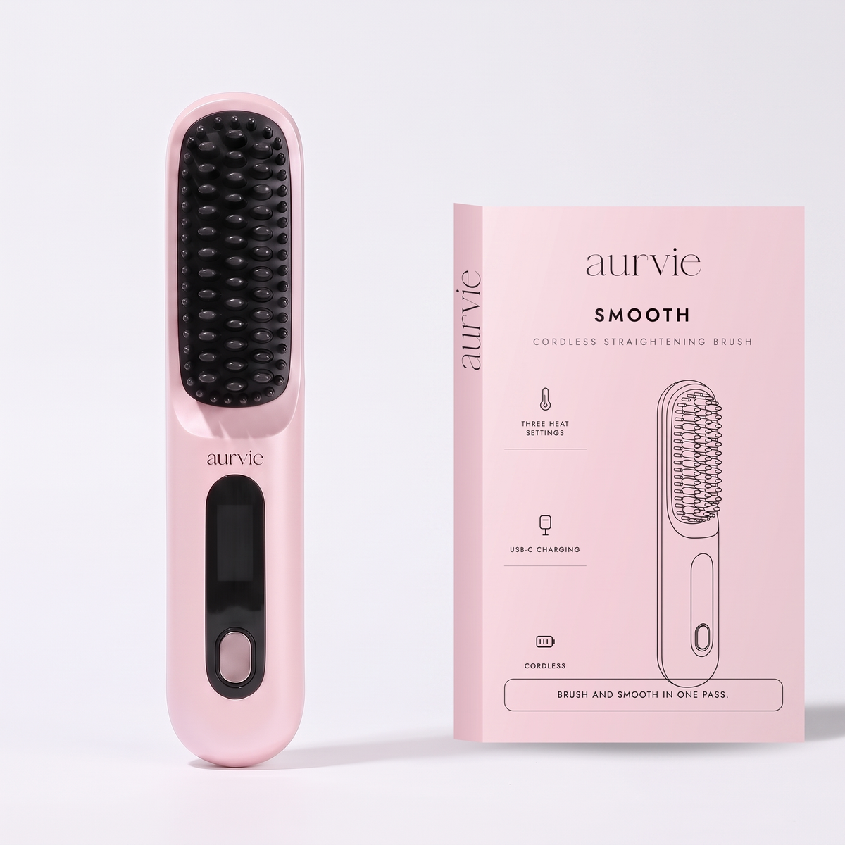 Aurvie Smooth straightening brush in pink beside its retail box (ALT)